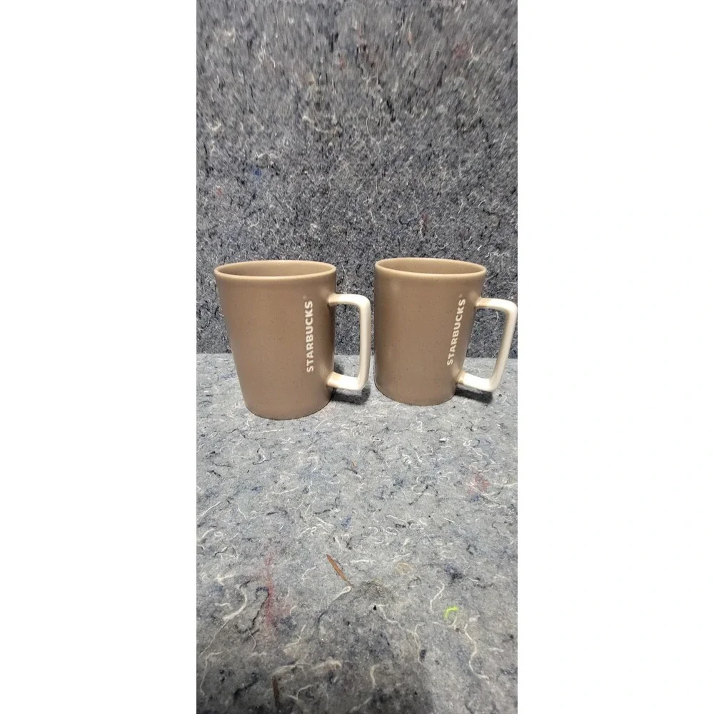 2016 Starbucks Light‎ Brown White Engraved Logo Coffee/Tea Mug 12 Oz Set of 2